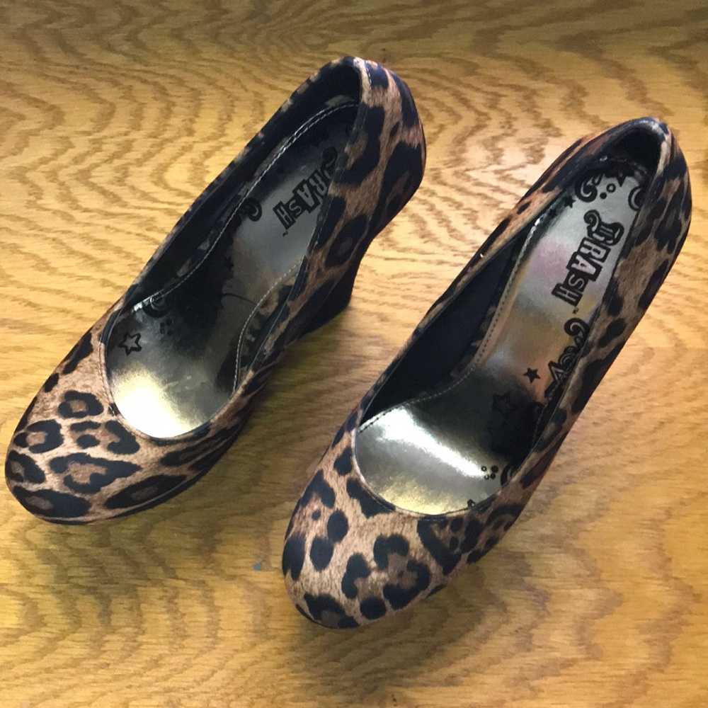 Cheetah print Size 7 Lady’s wedge